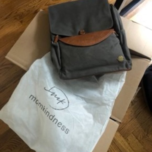 Brand new diaperbag/backpack with lovely leather purse